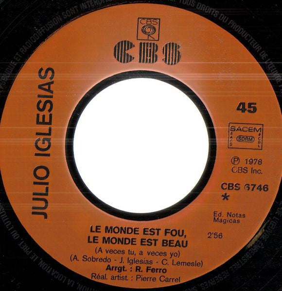 Julio Iglesias - Le Monde Est Fou, Le Monde Est Beau / J'Ai Besoin De Toi (7") - Discogs image 4