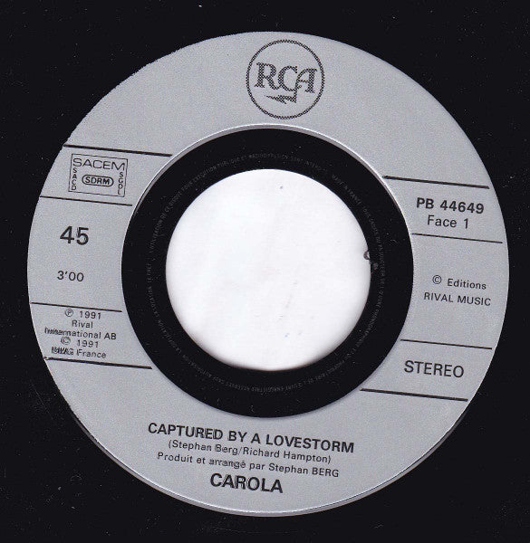 Carola (3) - Captured By A Lovestorm (7") - Discogs image 2