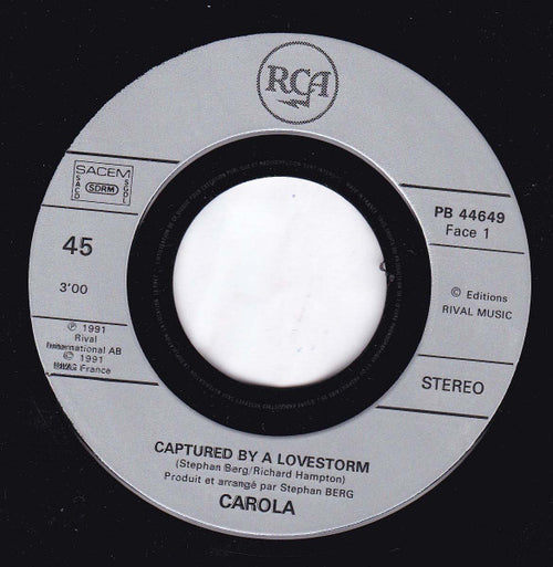 Carola (3) - Captured By A Lovestorm (7") - Discogs image 2